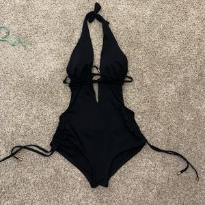 Black open back one piece